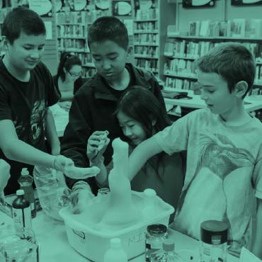 Kids doing a science experiment together
