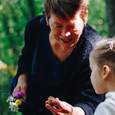 Elder person with child