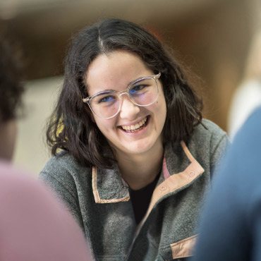 Person smiling at someone
