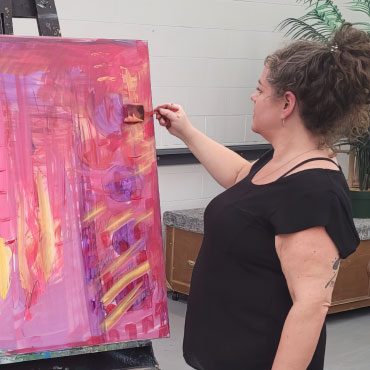 Alessandra Woodward, artist mentor for the Intuitive Acrylic Workshop.