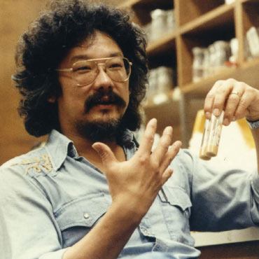 An image of David Suzuki, in a lab in the 70's