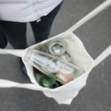 Bag filled with empty bottles