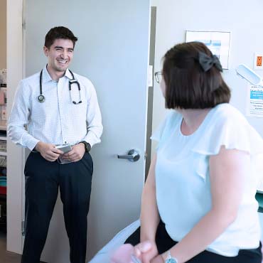 Doctor smiling at a patient