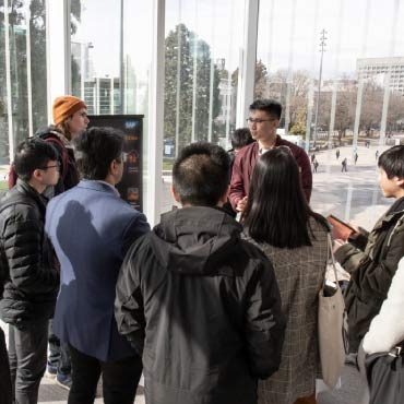 Students gathering around a career booth